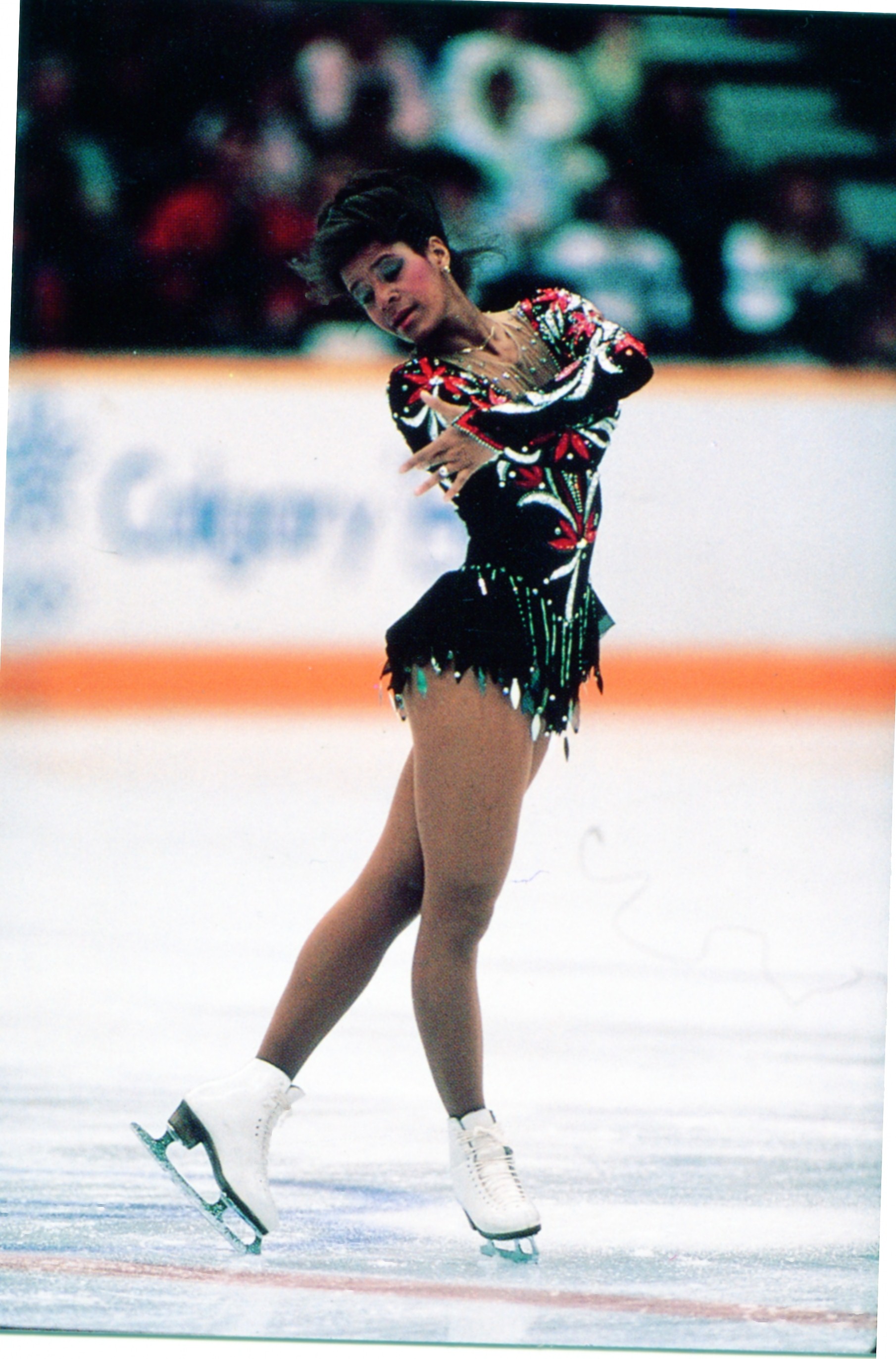 Debi Thomas poses in her starting position at a competition.