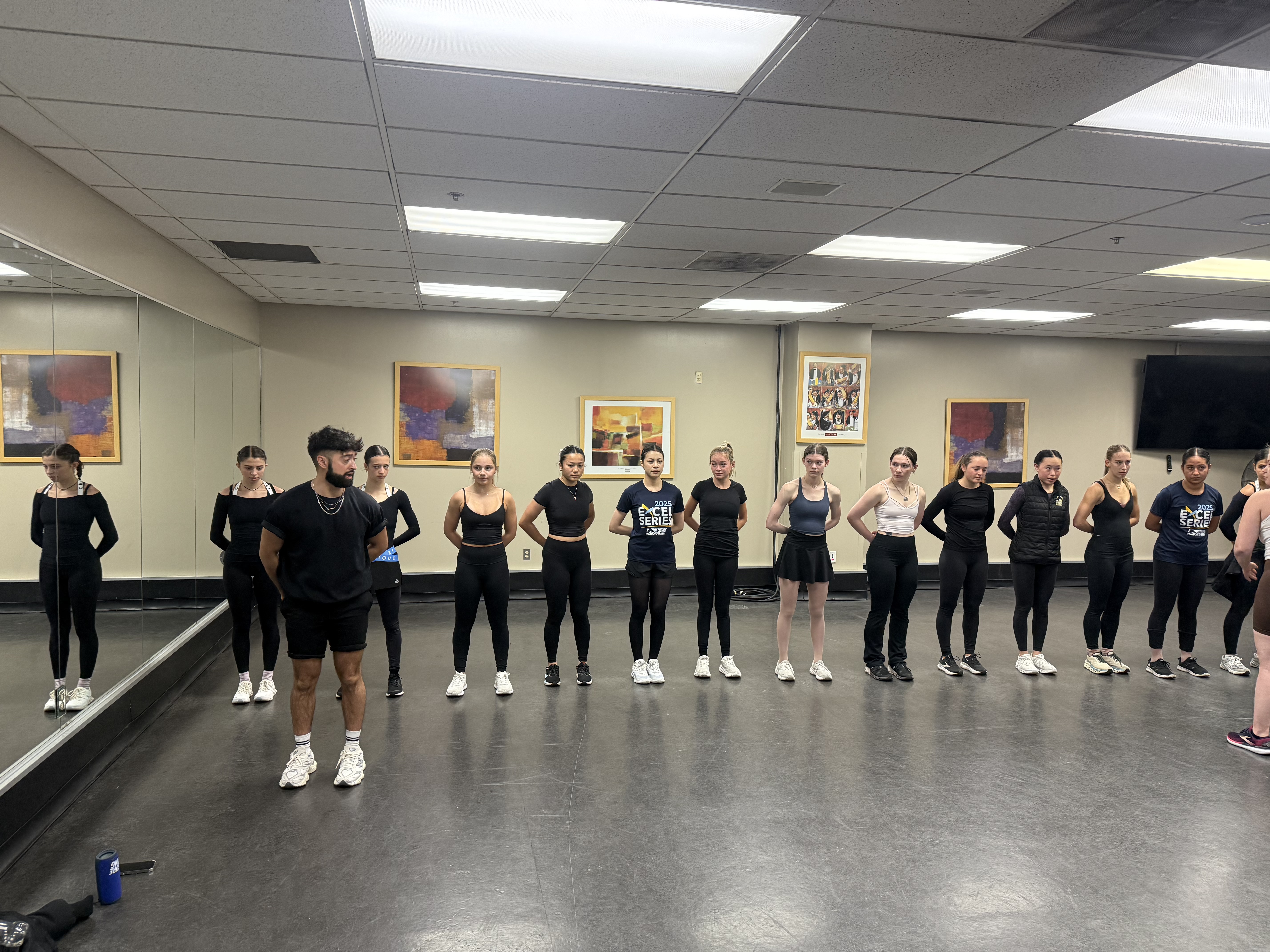 Choreographer Sebastian Arango leads a group of skaters during exhibition practice.