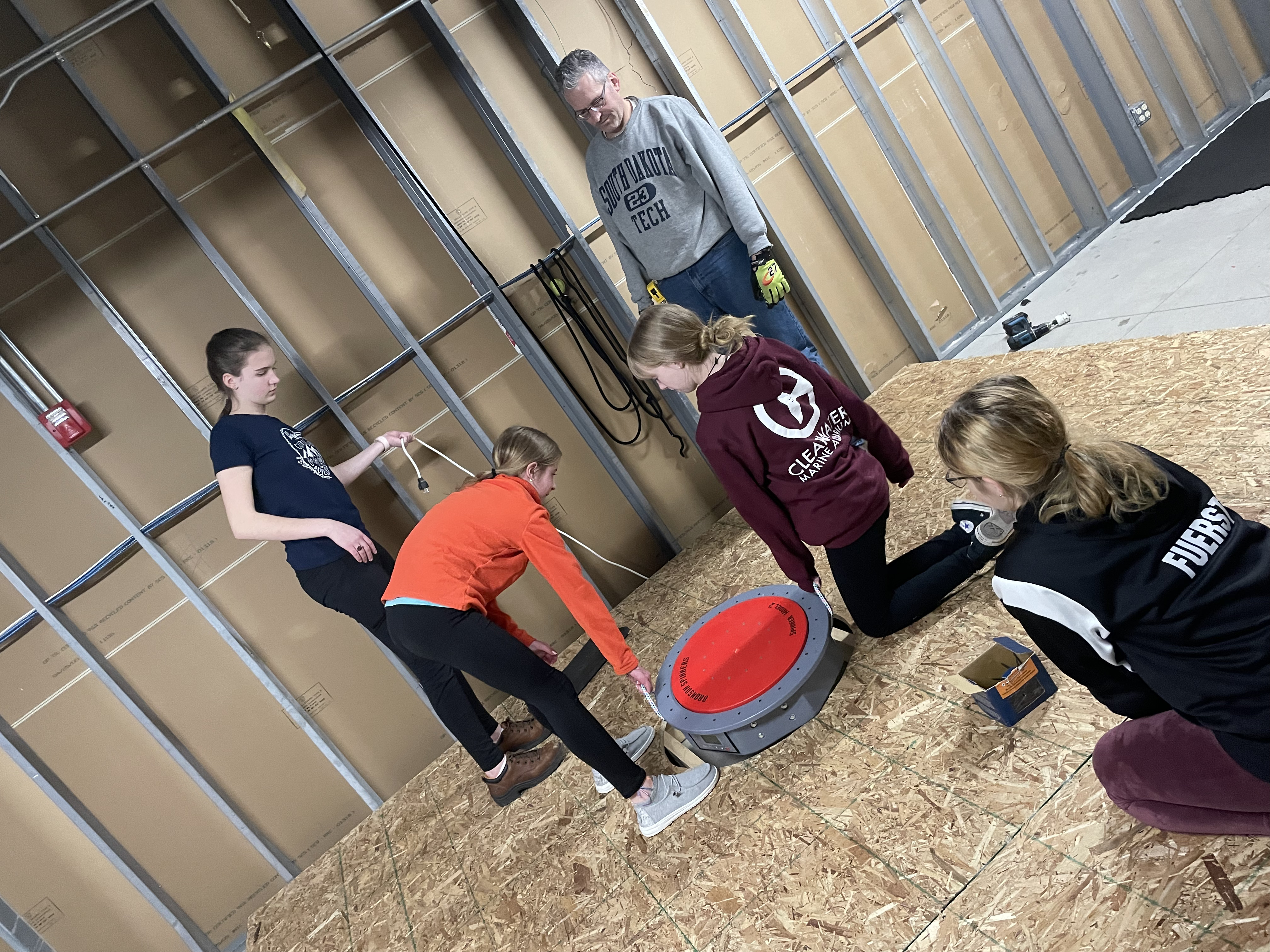 Chloe working on the Skate Spinner-her Eagle Scout project