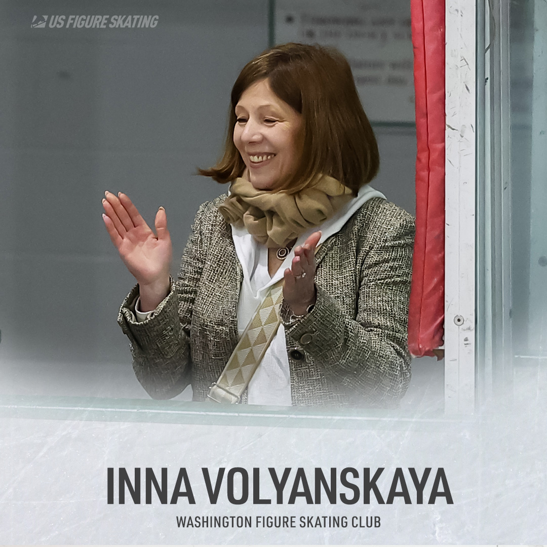 Photo of Inna Volyanskaya clapping with a smile on her face. Her name and the text "Washington Figure Skating Club" is written below her photo in black text