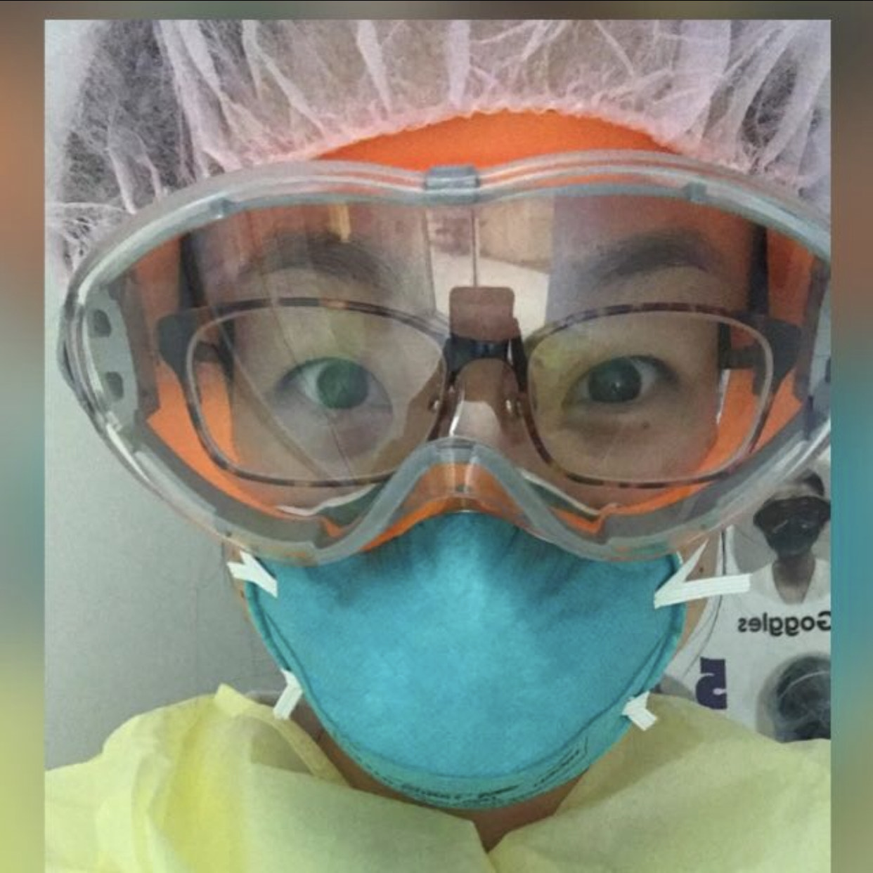 shan fung wears PPE