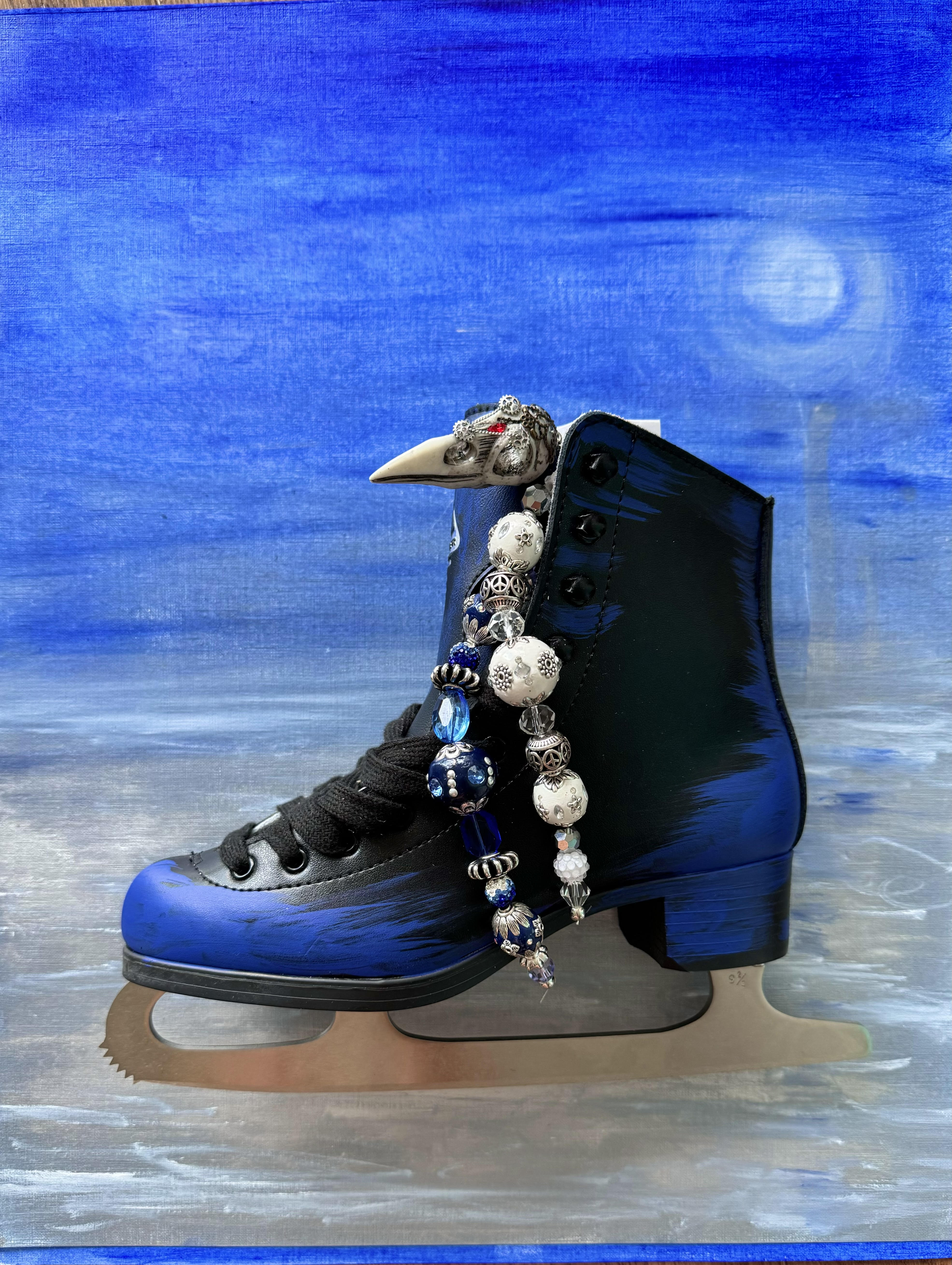 The art exhibition includes actual skates that symbolize images from the The Snow Queen story. 