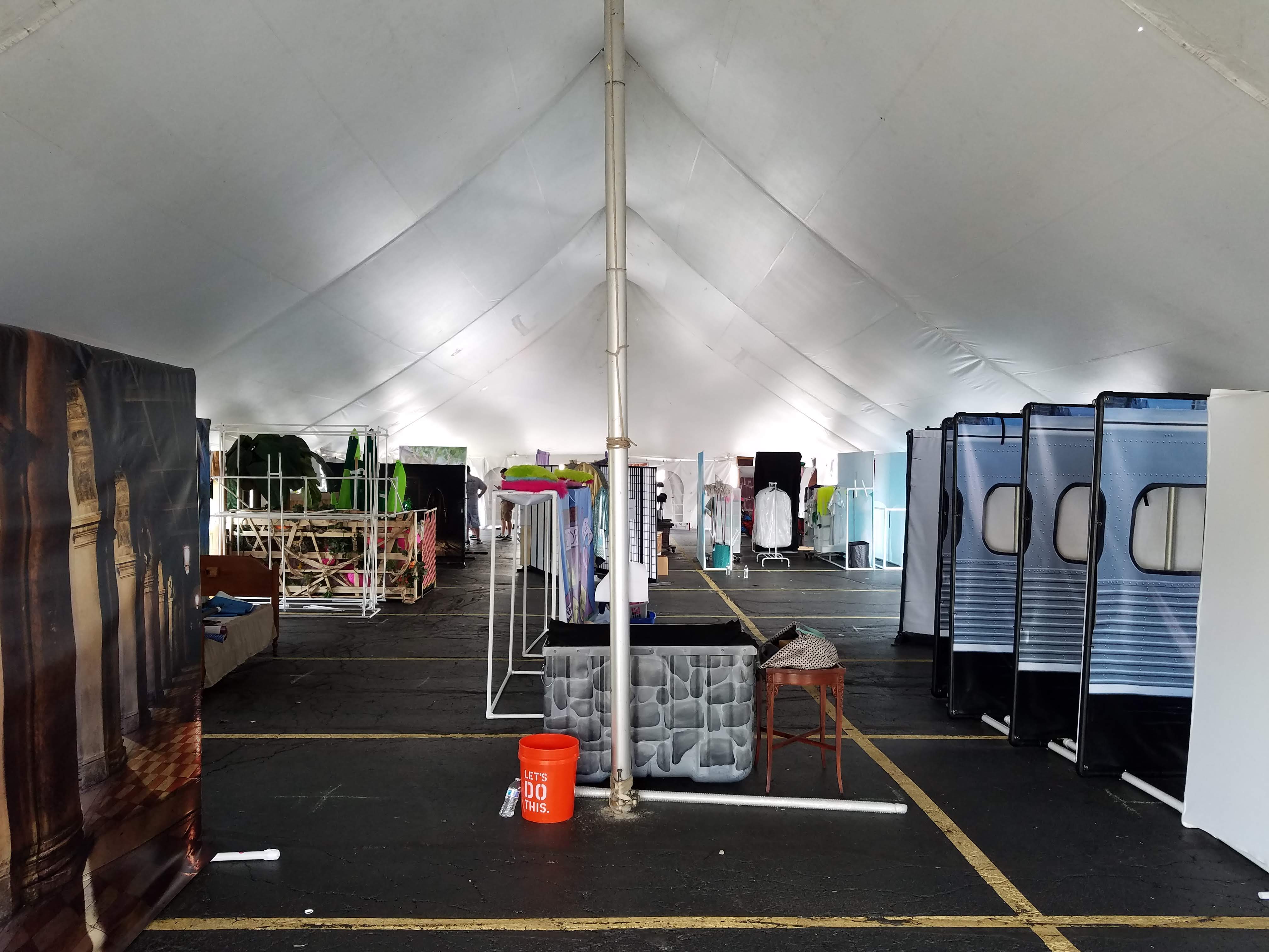 A big white tent houses the props and sets of hundreds of TOI teams.