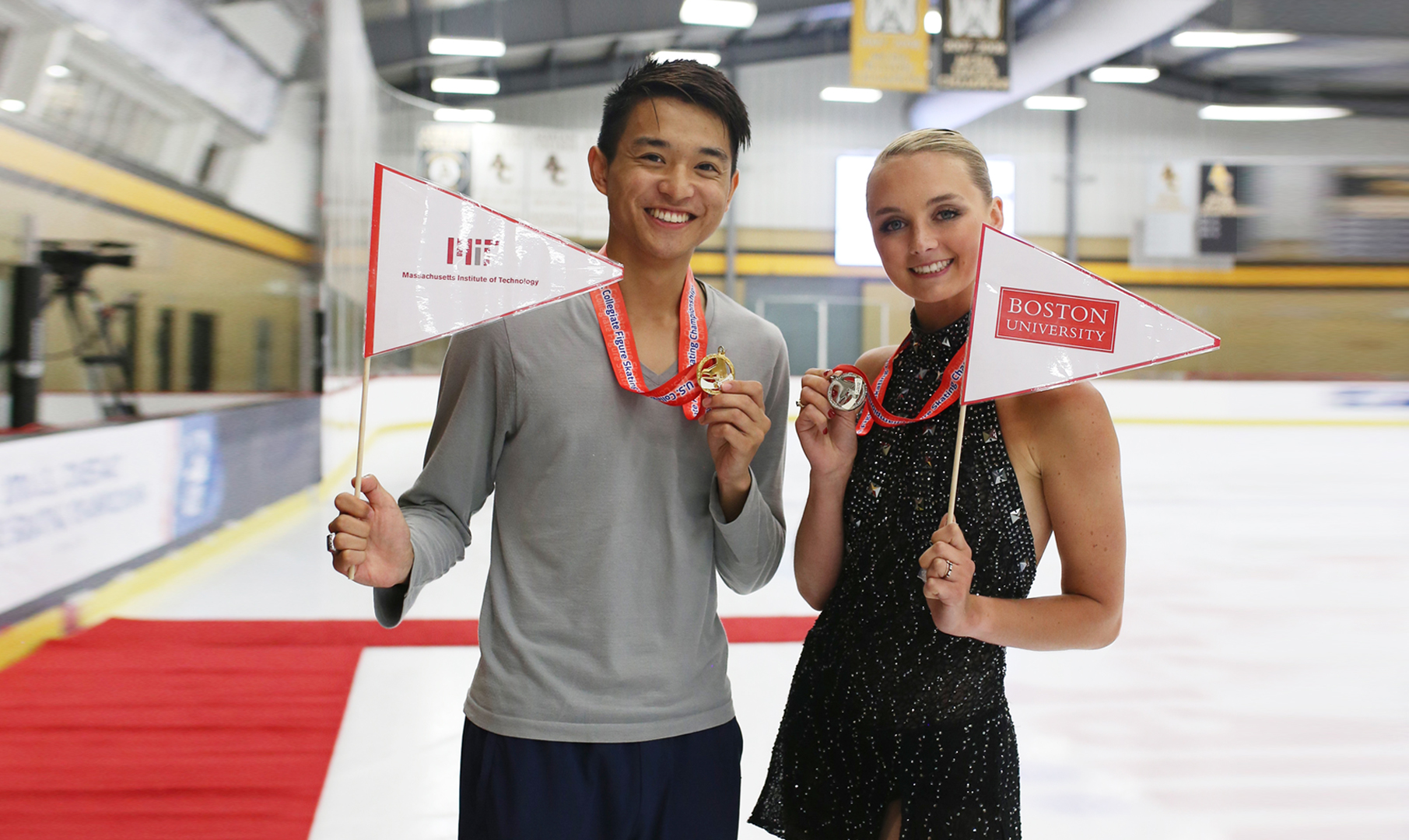 Skaters pose with awards at the U.S. Collegiate Figure Skating Championships.