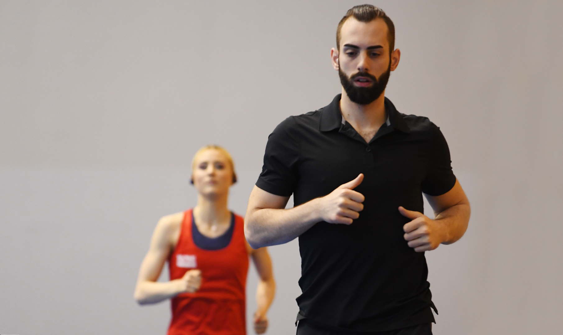 Ashley Cain and Timothy LeDuc warm-up before a competition. 