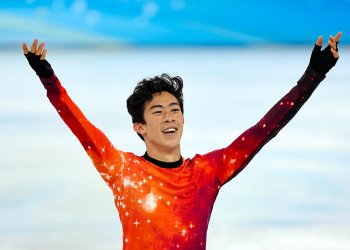 Nathan Chen celebrates after competing in the free skate at the 2022 Beijing Olympic Games 